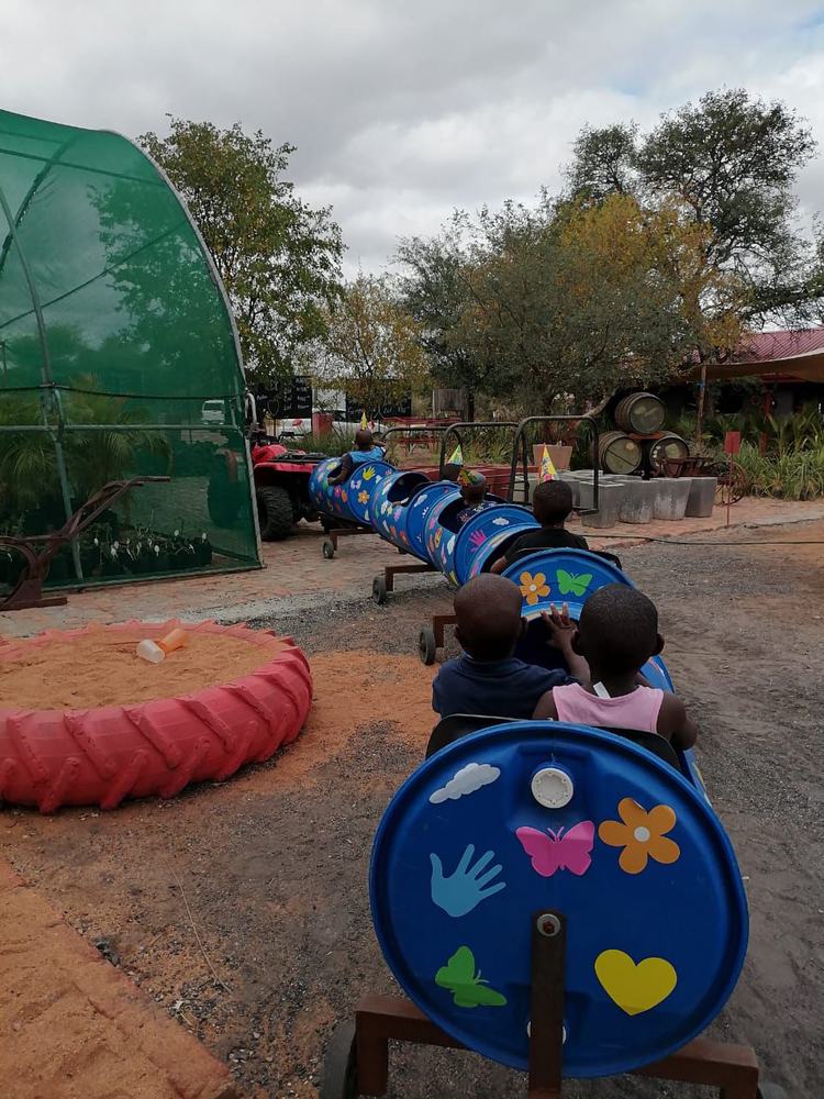 Children on tire train ride